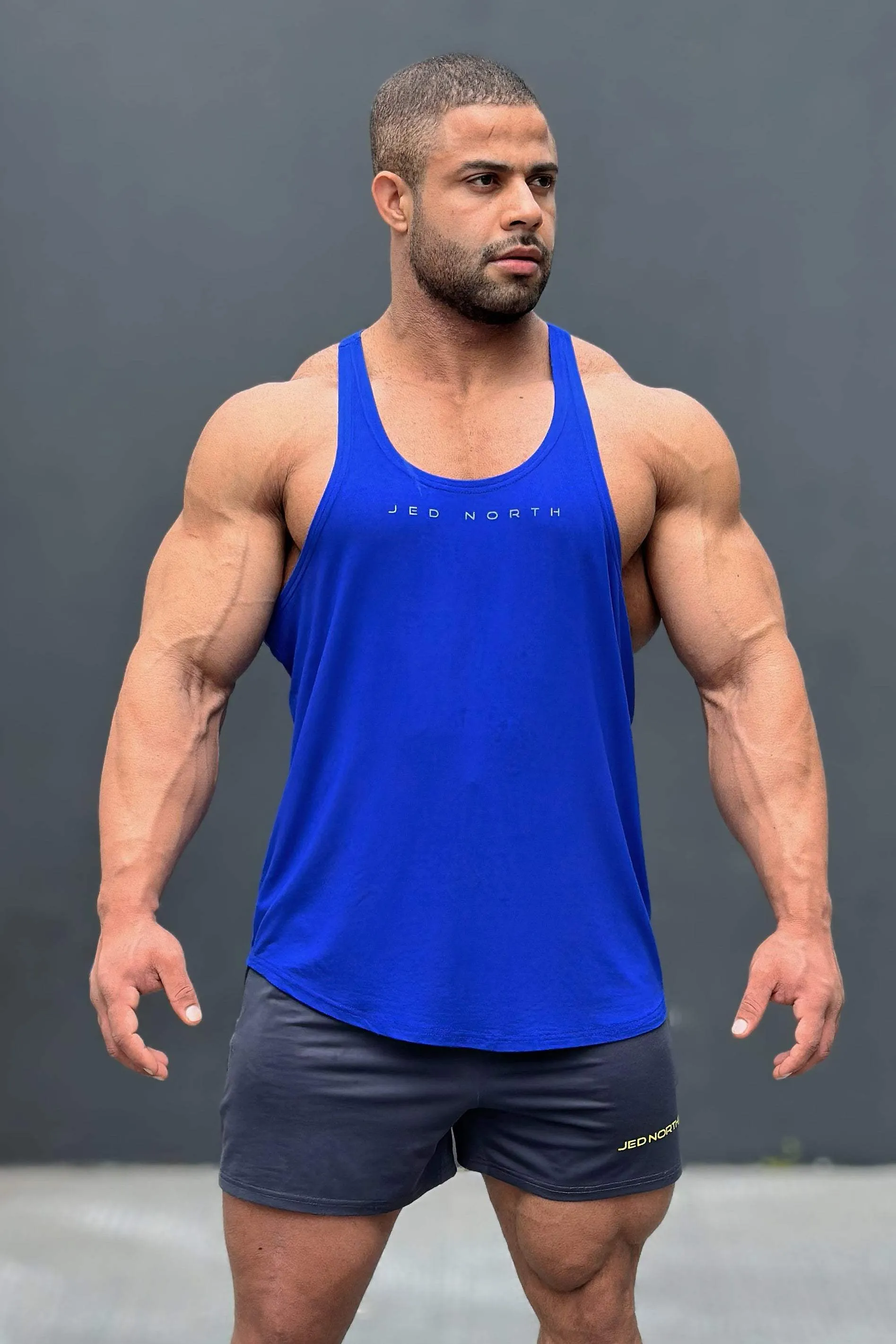 Classic Bodybuilding Racerback Stringer - Royal Blue manual control