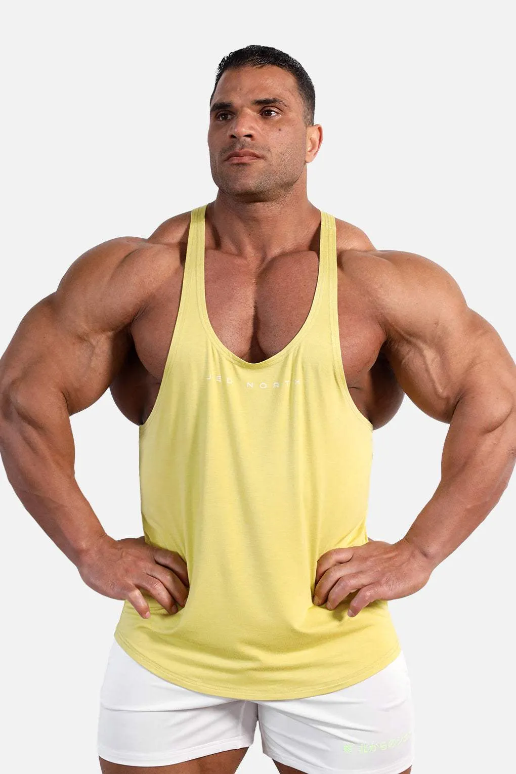 Classic Bodybuilding Racerback Stringer - Mustard Yellow environmental - friendly