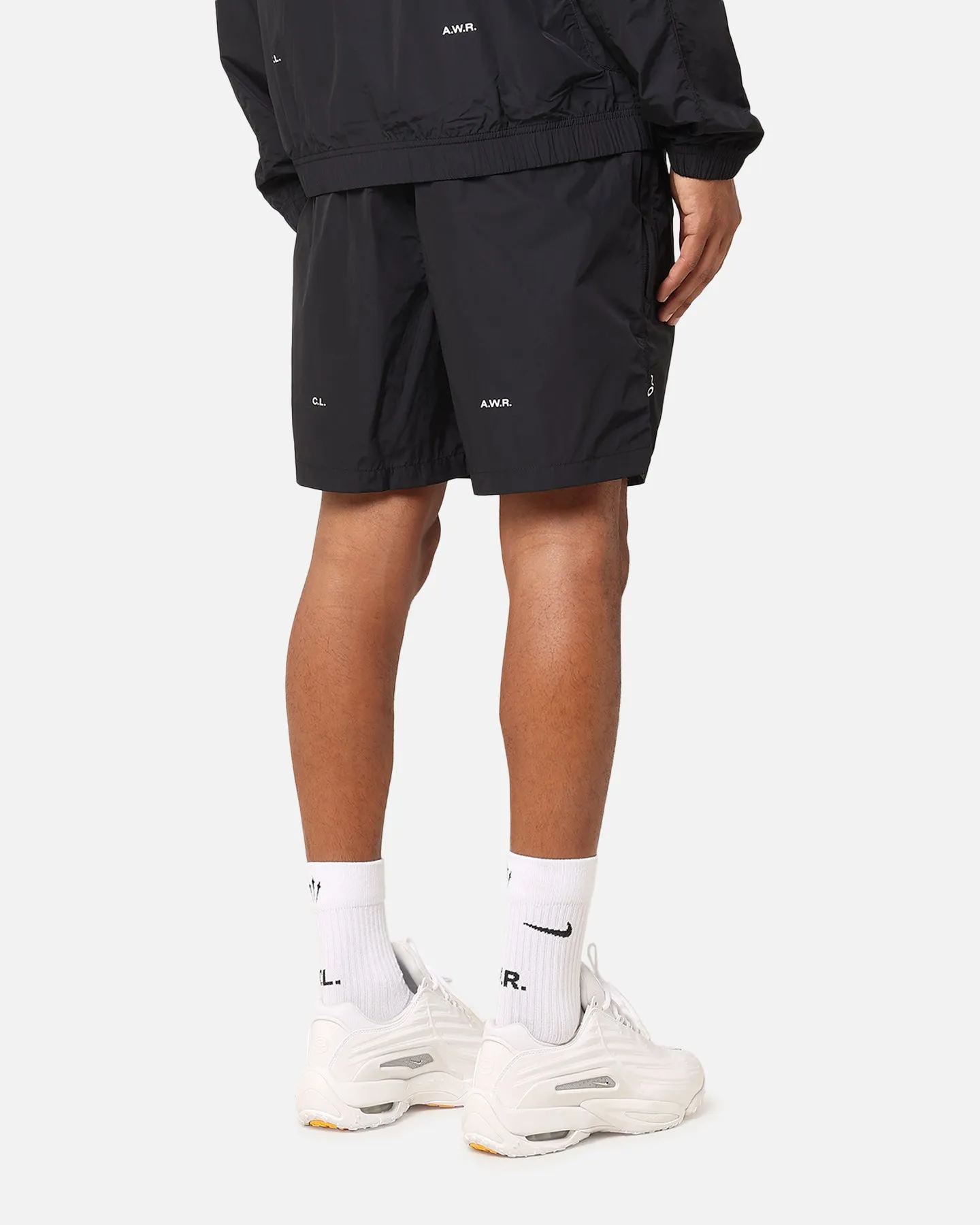 Nike Nocta Cardinal Nylon Shorts Black Sleek Cut Flexible shape