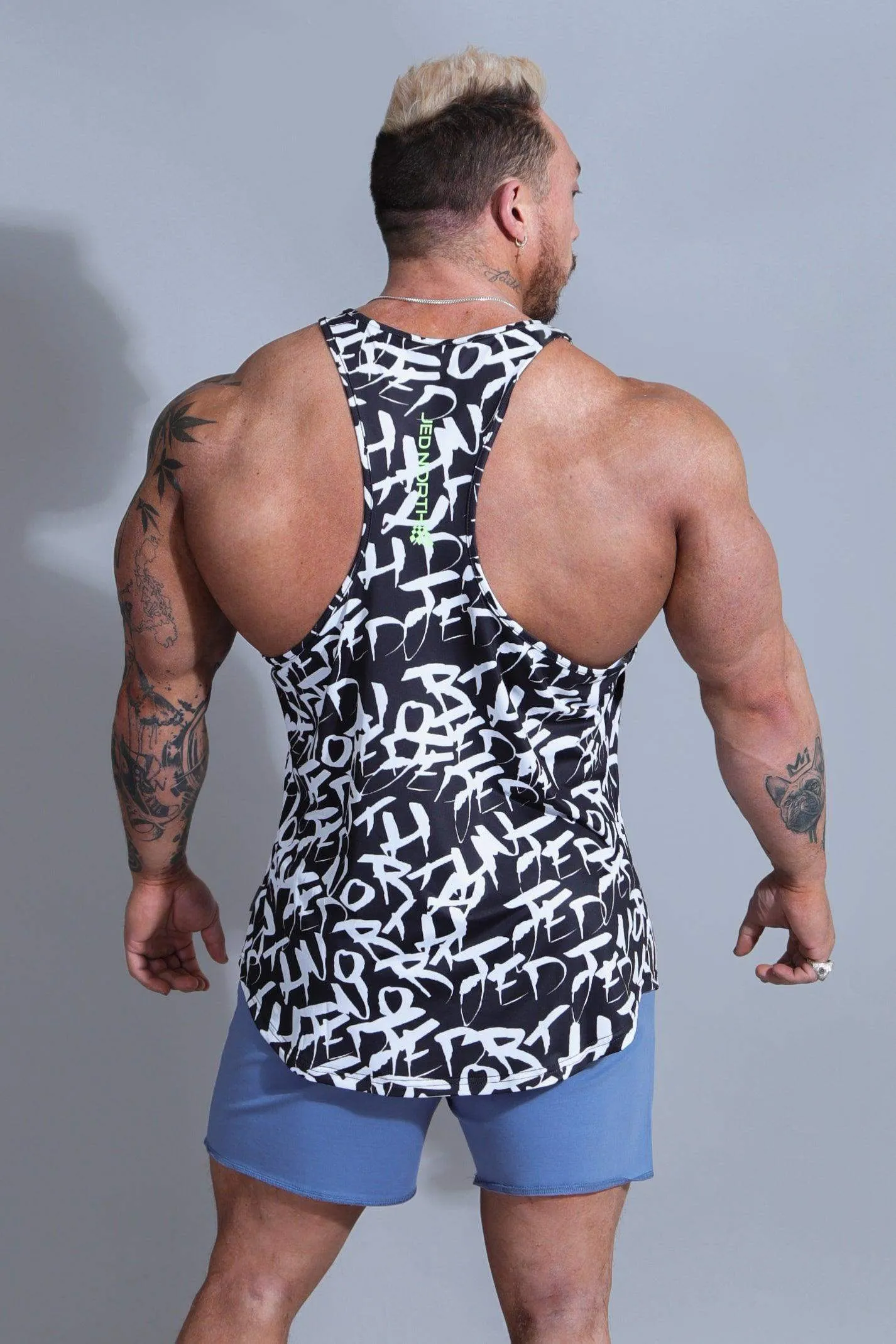 Graphic Muscle Stringer - Chaotic Black Anti Chafe Technology Versatile Layering Piece