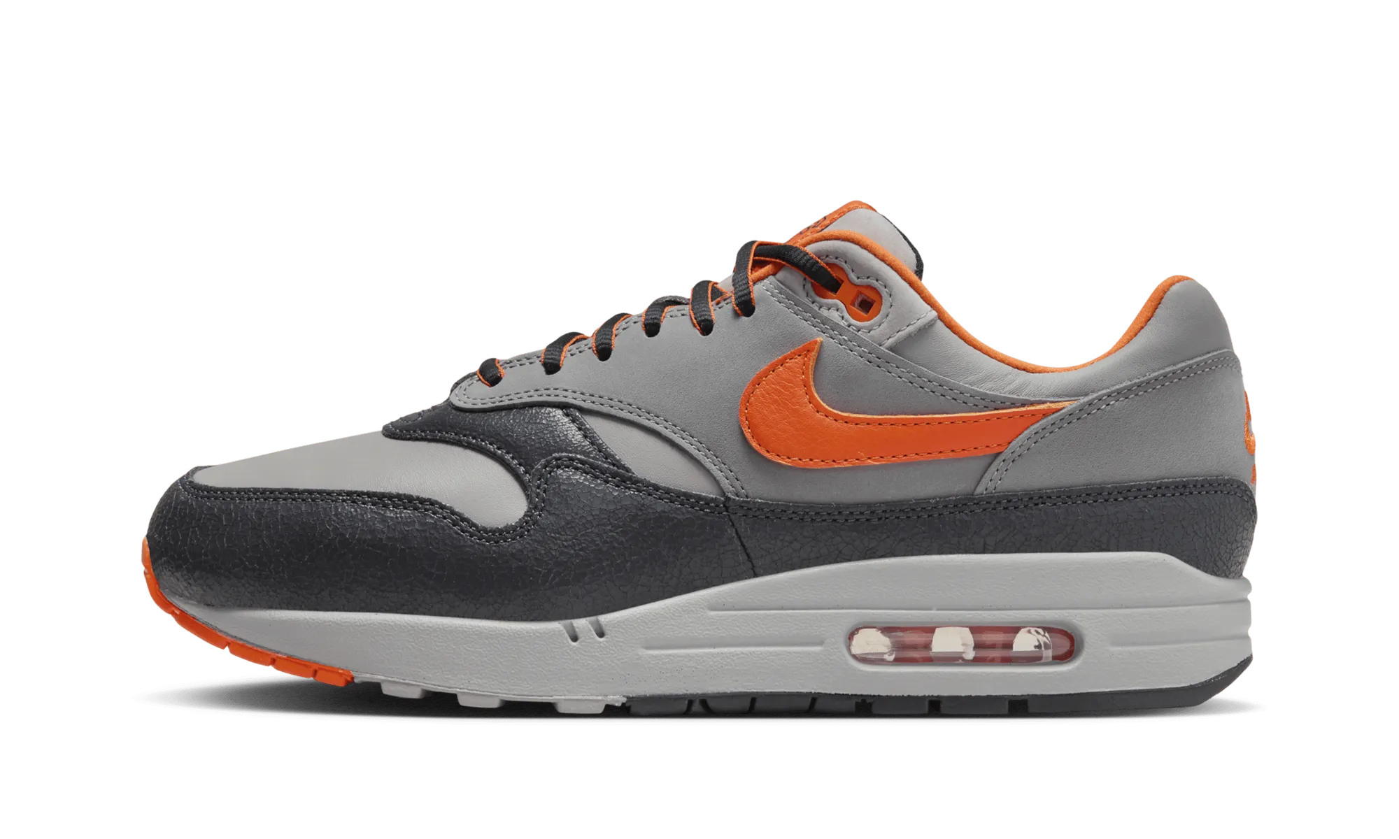 Air Max 1 SP "HUF BRILLIANT ORANGE" Stretch Fabric Travel Light