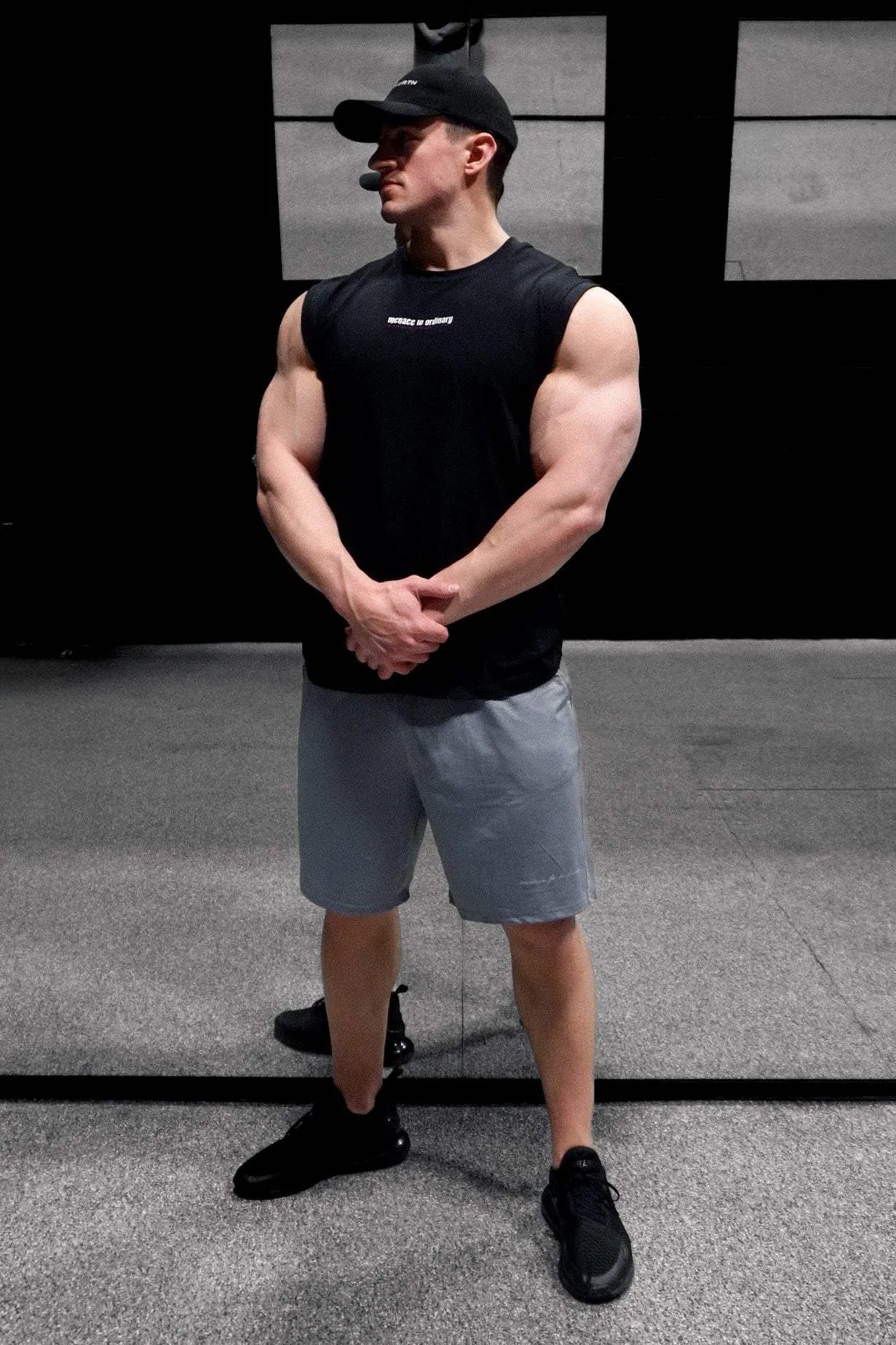 Sleeveless Muscle Tee - Black spherical