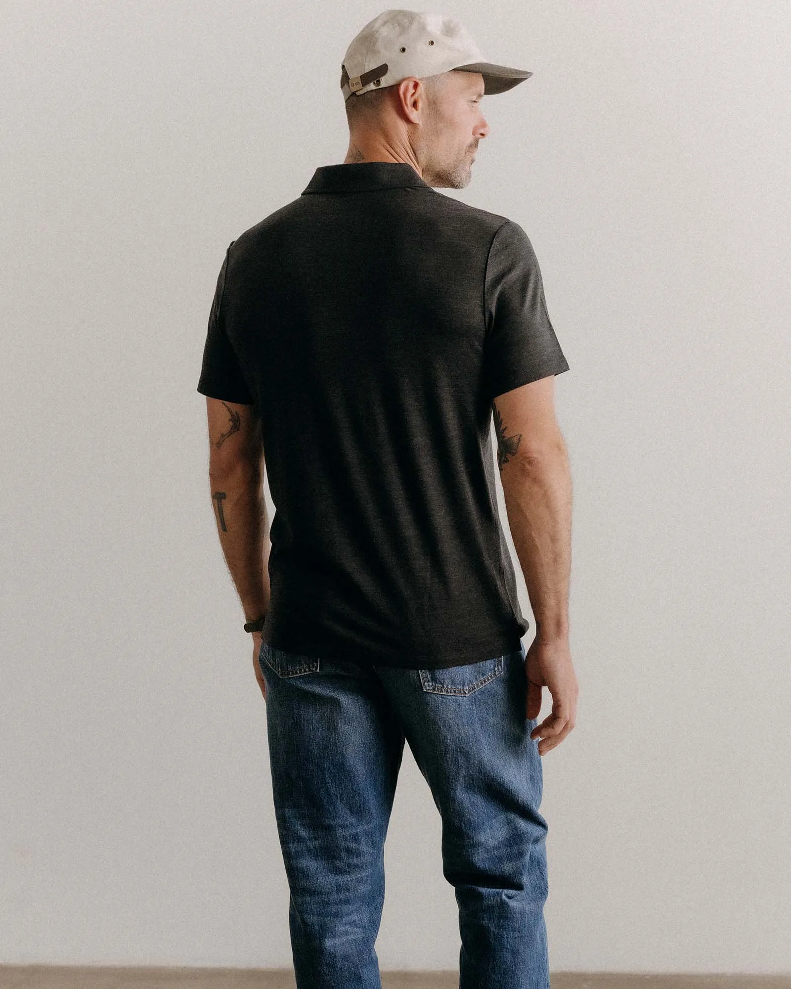 The Merino Polo in Heather Black Cozy Vibe Wear Smart Design